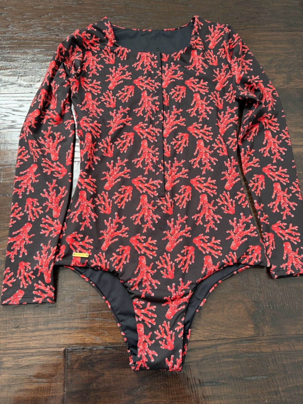 Long-Sleeve One-Piece Swimsuit in Black with Red Coral Print